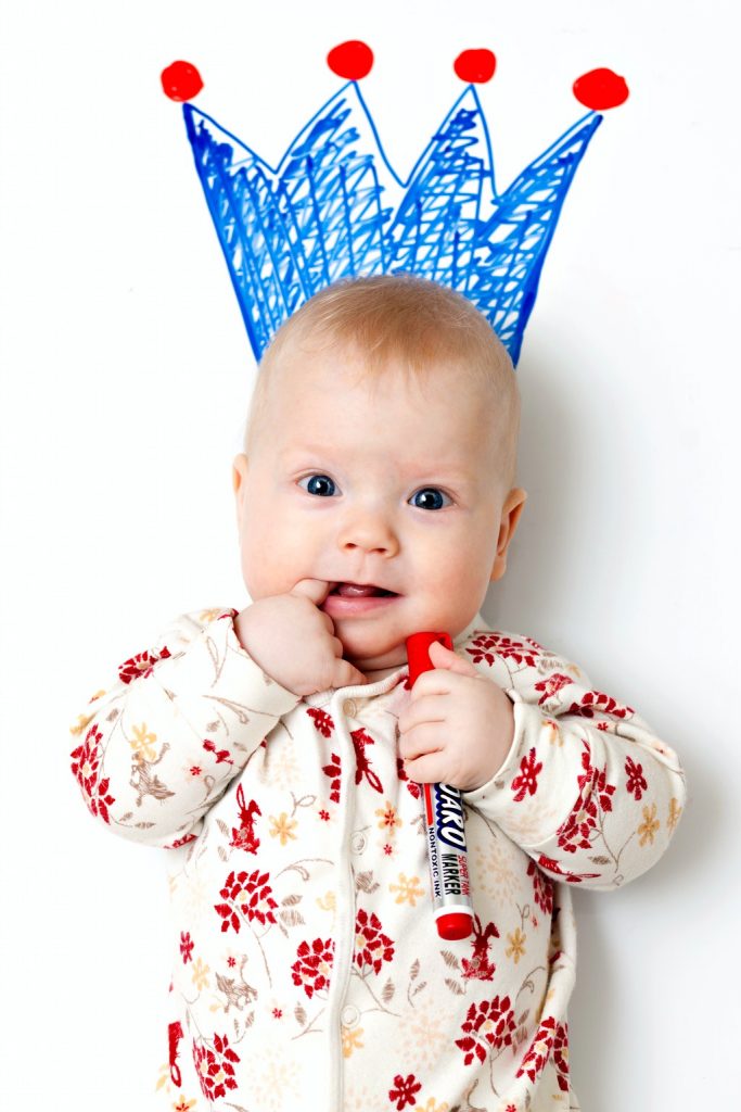 baby-in-white-and-red-floral-pajama